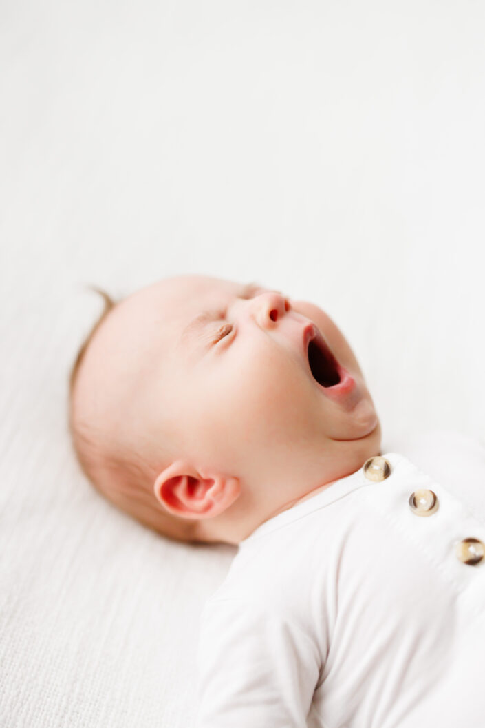 seattle newborn photographer, candid lifestyle baby photography, best, top, in home, studio natural light, baby yawn